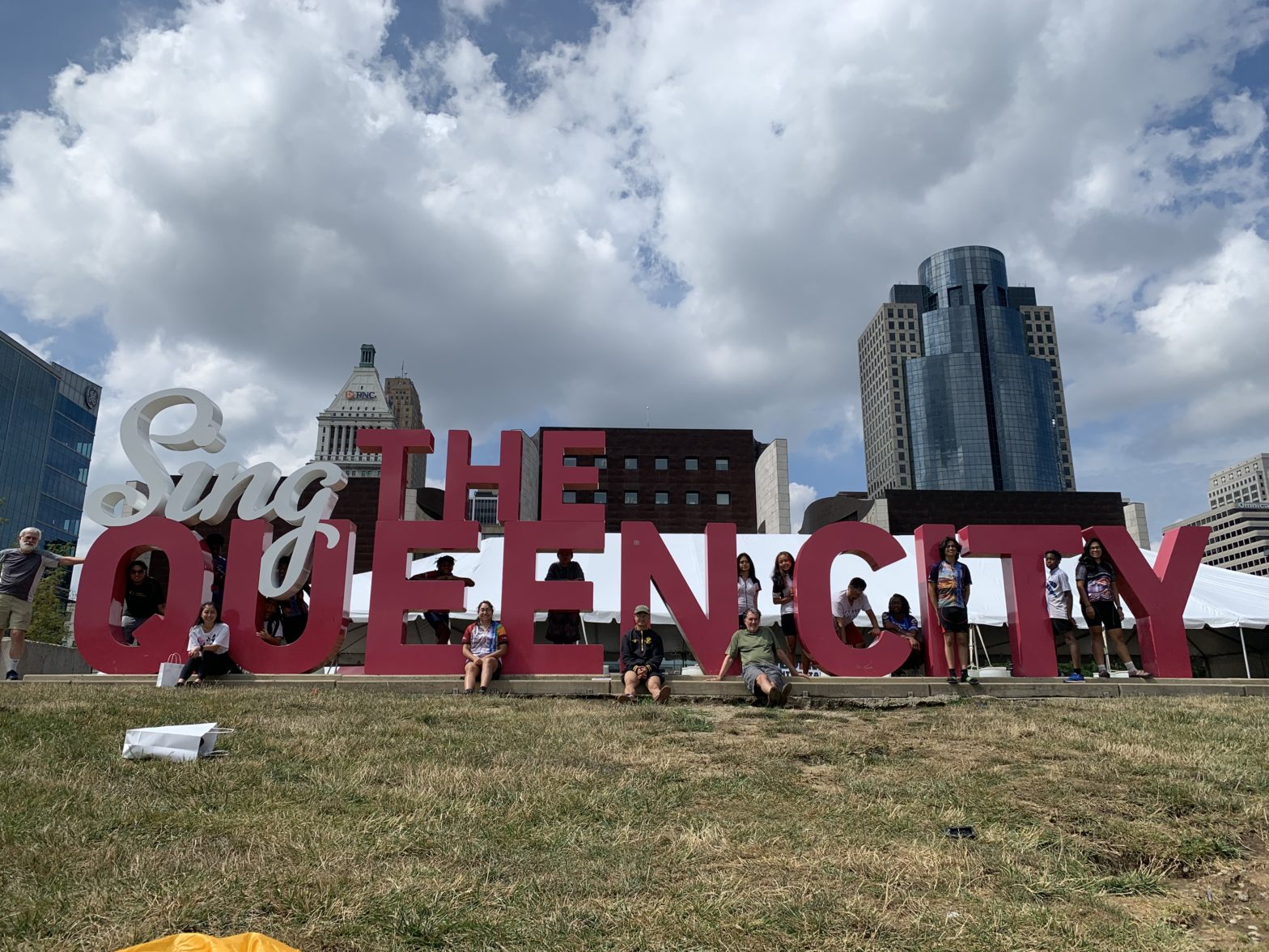 youth in the sign of Sing the Queen City