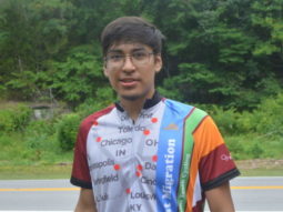 youth cyclist David looking into camera with a smile