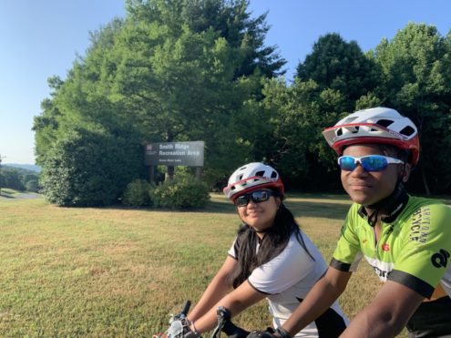 young cyclists smiling at camera