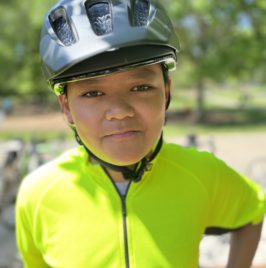 young boy smiling into camera